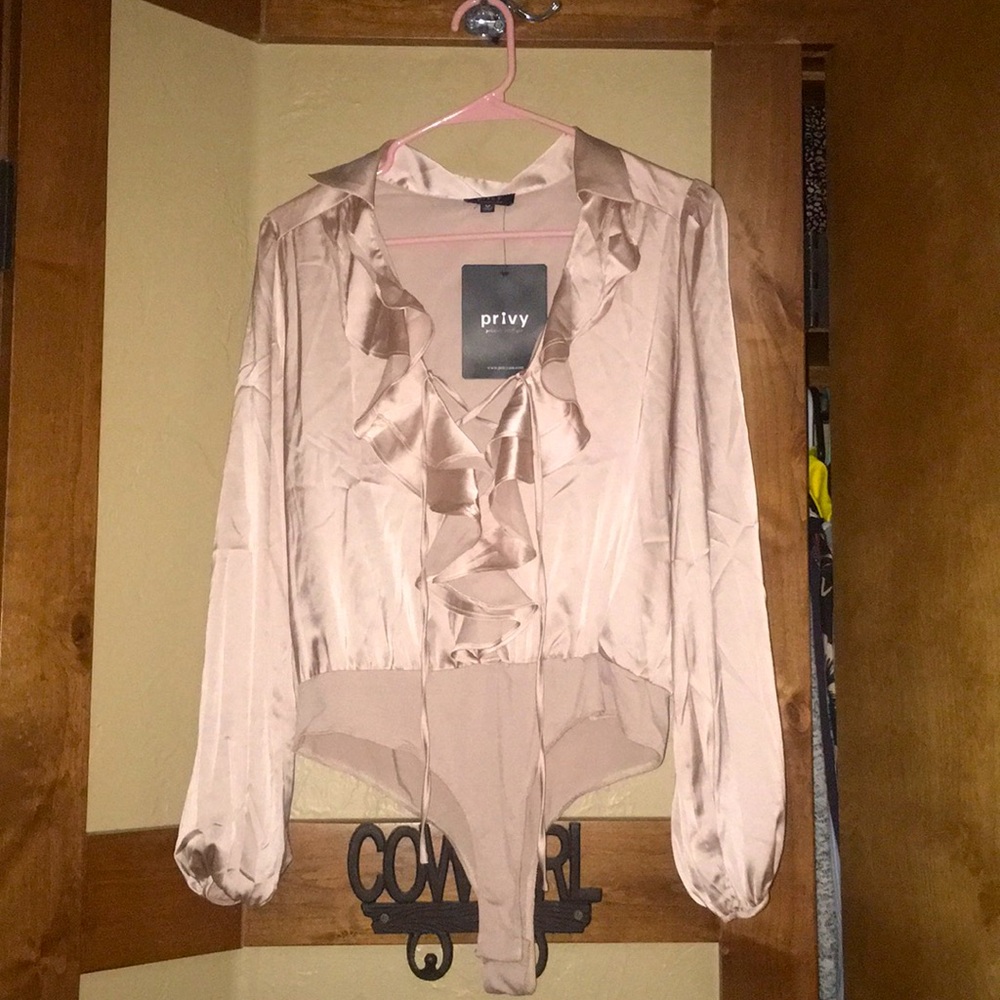 light pink nude body suit with ruffles